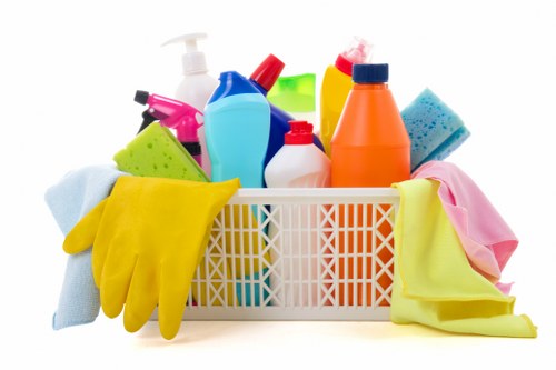 Professional cleaner maintaining shared hallway spaces