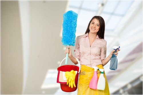 Professional cleaner carrying out move-out cleaning in a rented property